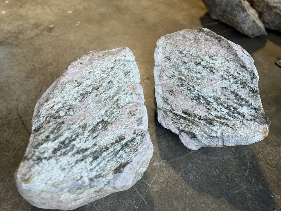 Bookmatched pair of uncut pink Silver Plume granite